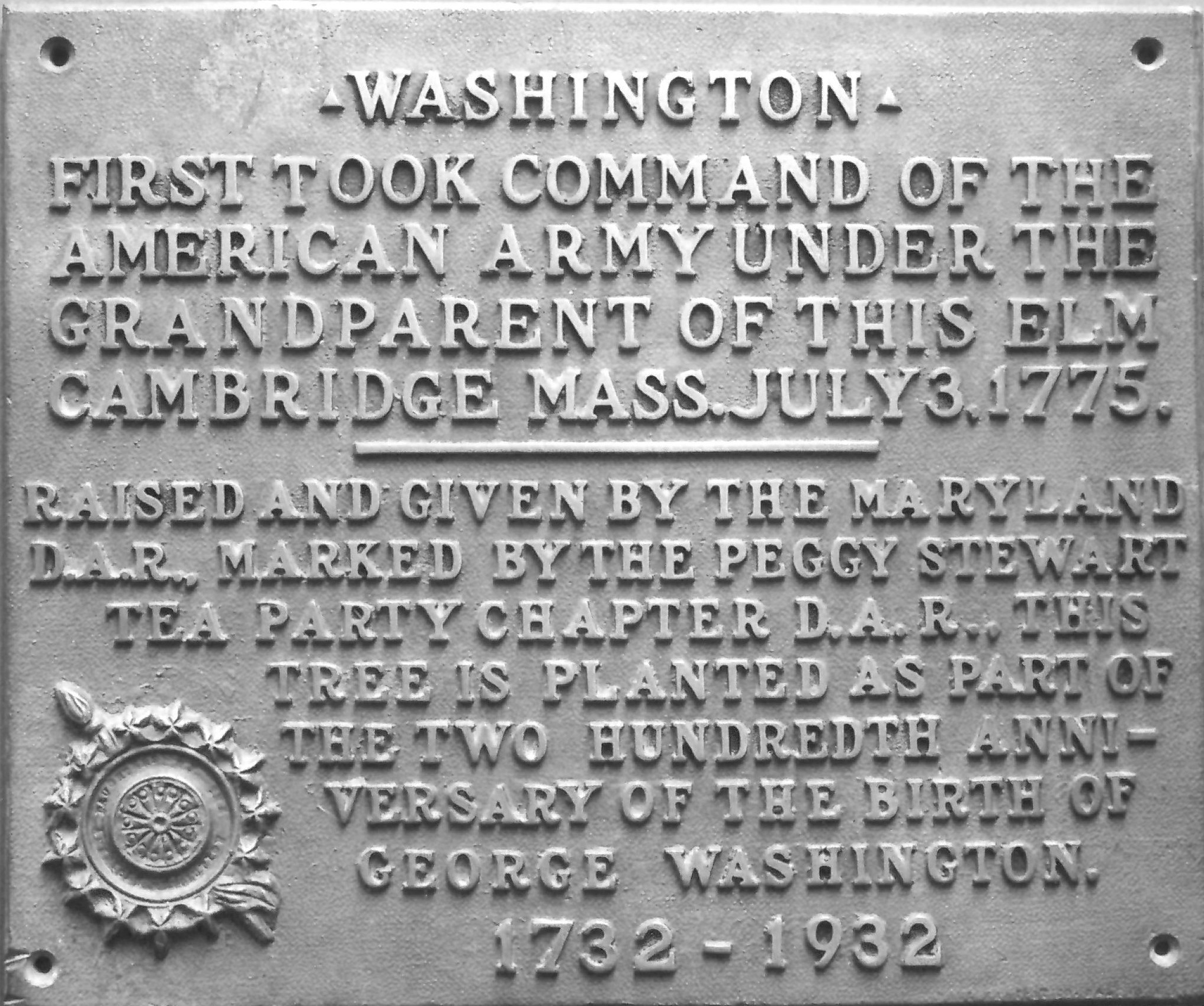 The bronze tablet that was placed near the Washington Elm at the Naval Academy.