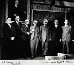 Albert A. Michelson (center) with (left to right) M.L. Humason, Edwin Hubble, C.E. St. John, Albert Einstein, W.W. Campbell, and W.S. Adams in the library of the Mount Wilson Observatory, Pasadena, California, in early 1931. [955K]