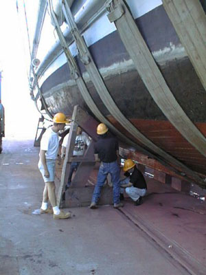 Men repairing boat